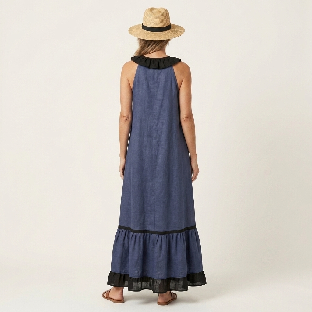 Robe maxi sans manches Danoir Paris avec col volant et détails contrastés, tissu léger et fluide, vue de face.