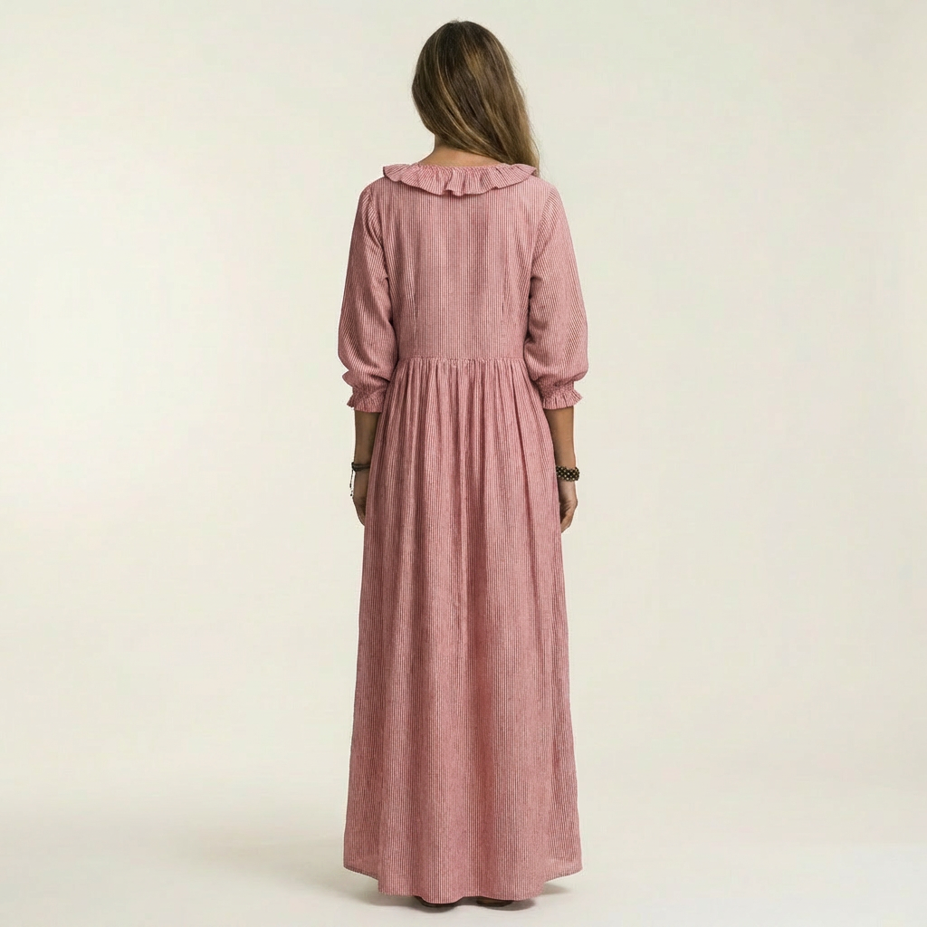 Robe maxi rayée Danoir Paris avec volants et décolleté en V, longueur fluide et style élégant pour l'été.