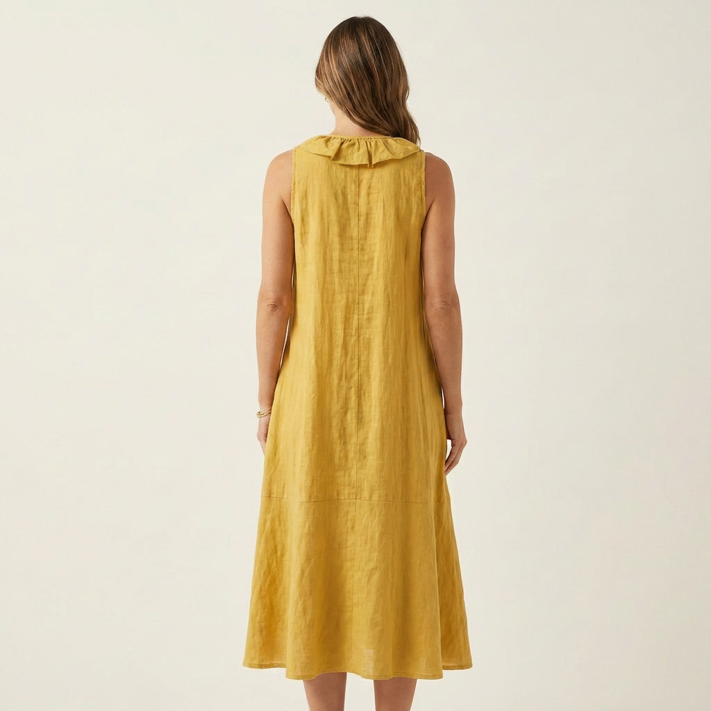 Robe maxi sans manches Vicky de Danoir Paris avec col en V et détails de volants, longue et élégante.