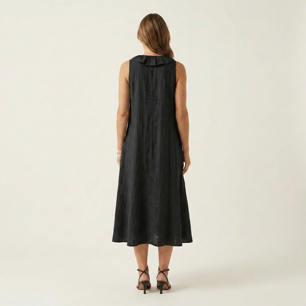 Robe maxi sans manches Vicky de Danoir Paris avec col en V et volants, longueur élégante et tissu fluide.