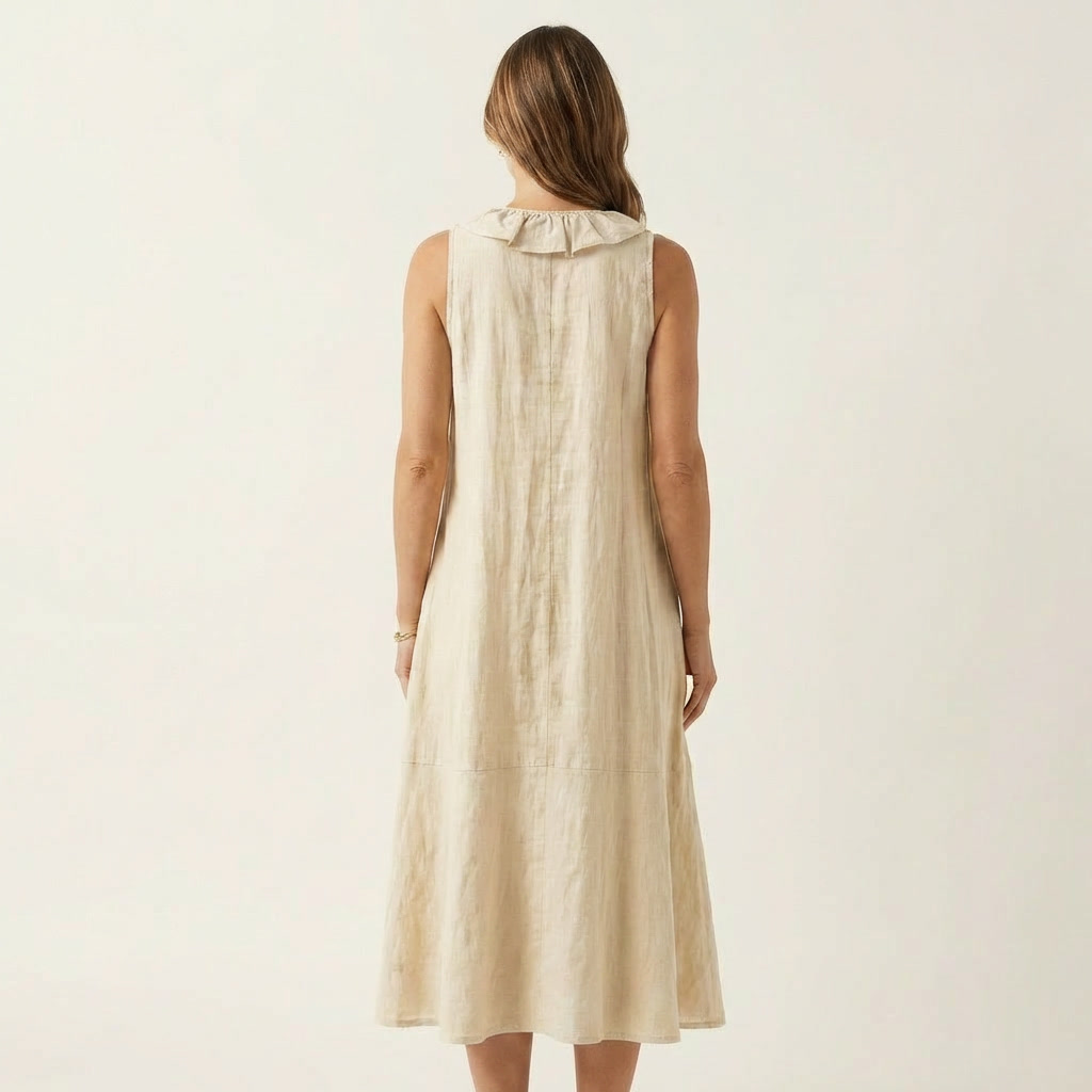 Robe maxi sans manches Vicky de Danoir Paris avec col en V et détails de volants, tissu fluide et élégant.