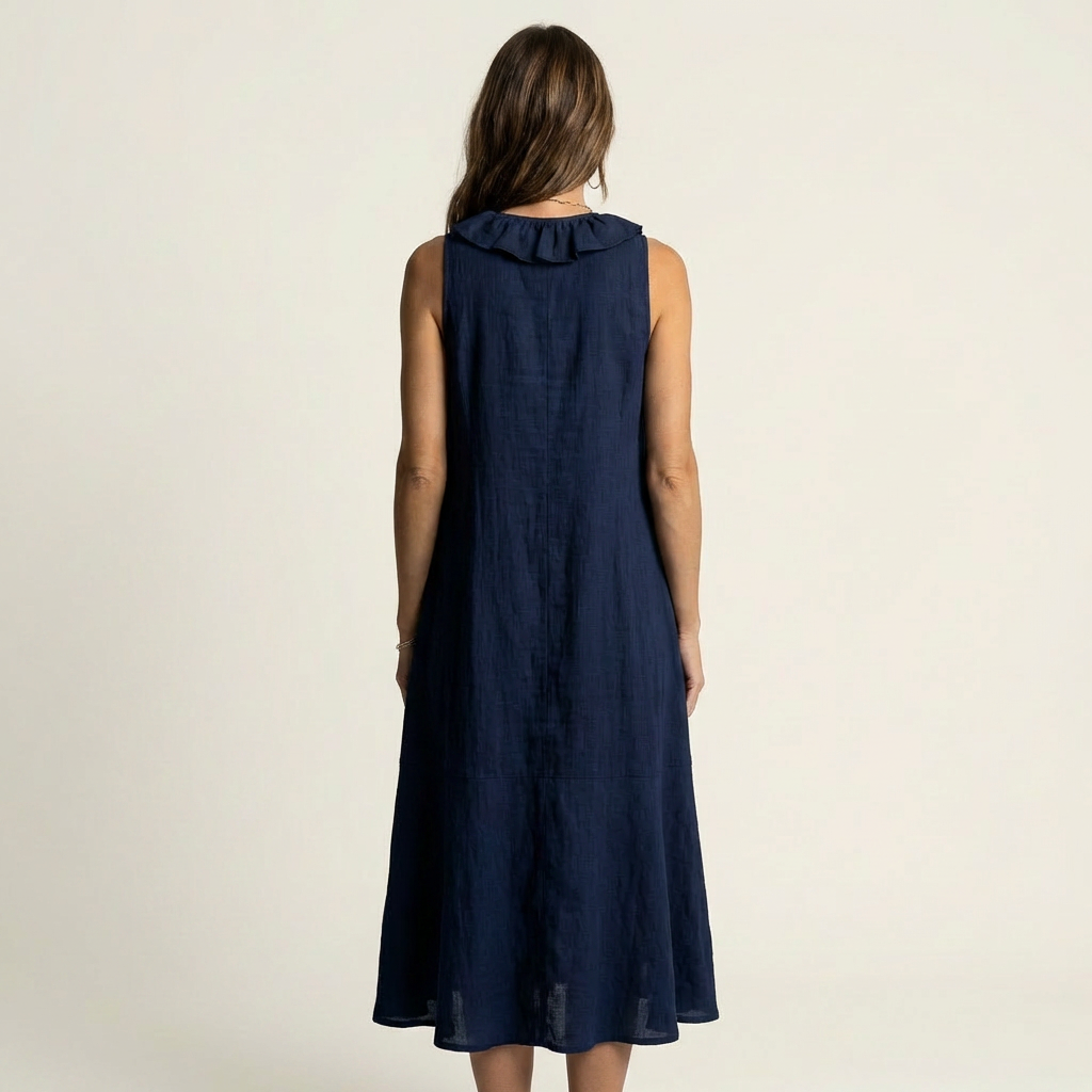 Robe maxi sans manches Vicky de Danoir Paris avec col en V et volants, en tissu fluide et élégant.