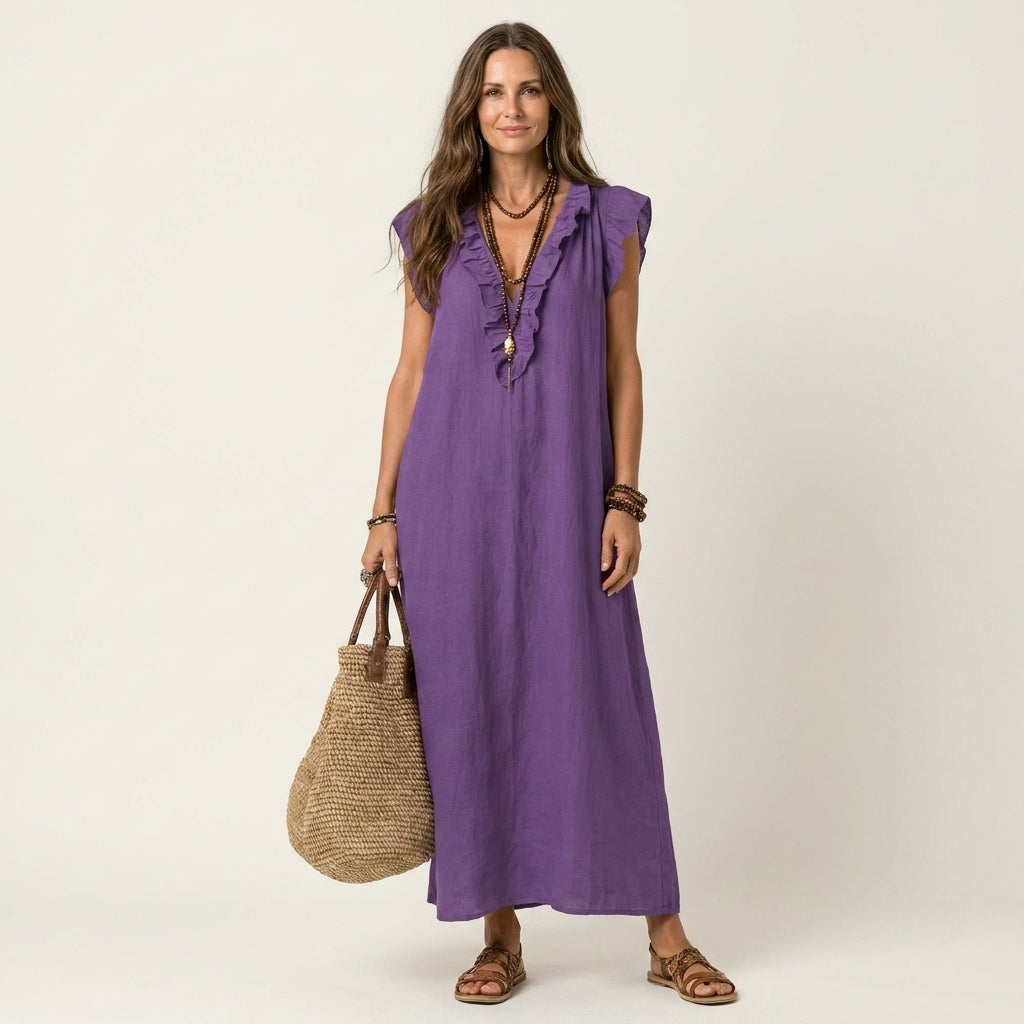 Robe maxi Josette à col V avec volants, robe élégante Danoir Paris, en tissu fluide et léger, portée avec style.
