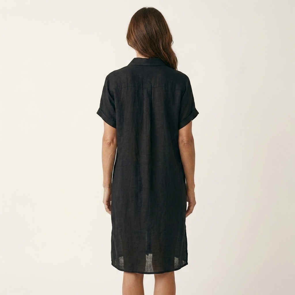 Robe chemise midi Nidalie Danoir Paris avec manches retroussées, en tissu léger, portée sur mannequin blanc.