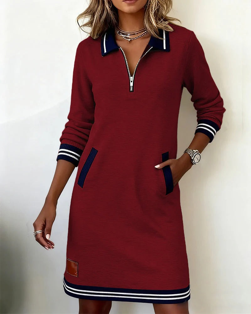 Robe Danoir Paris Delia avec col en V, fermeture éclair frontale, coupe élégante et tissu fluide, vue de face.