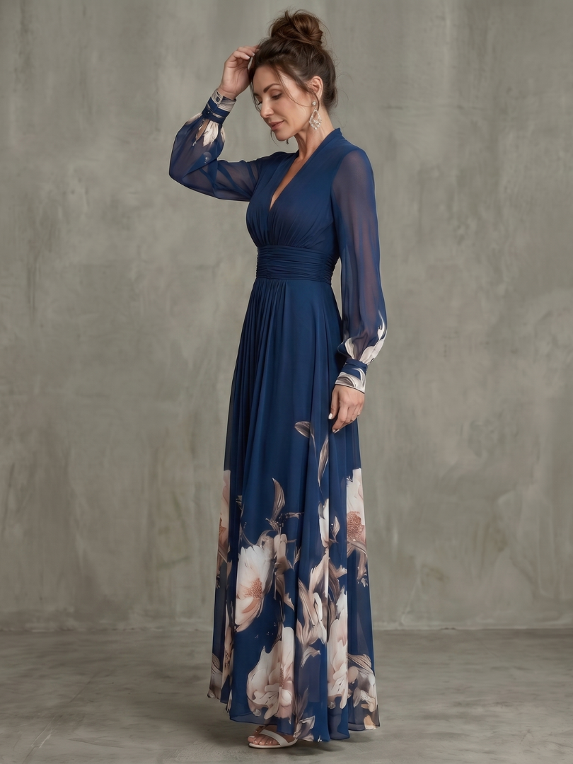 Robe maxi à manches transparentes et ourlet floral Danoir Paris, détail de la robe avec motifs floraux élégants.