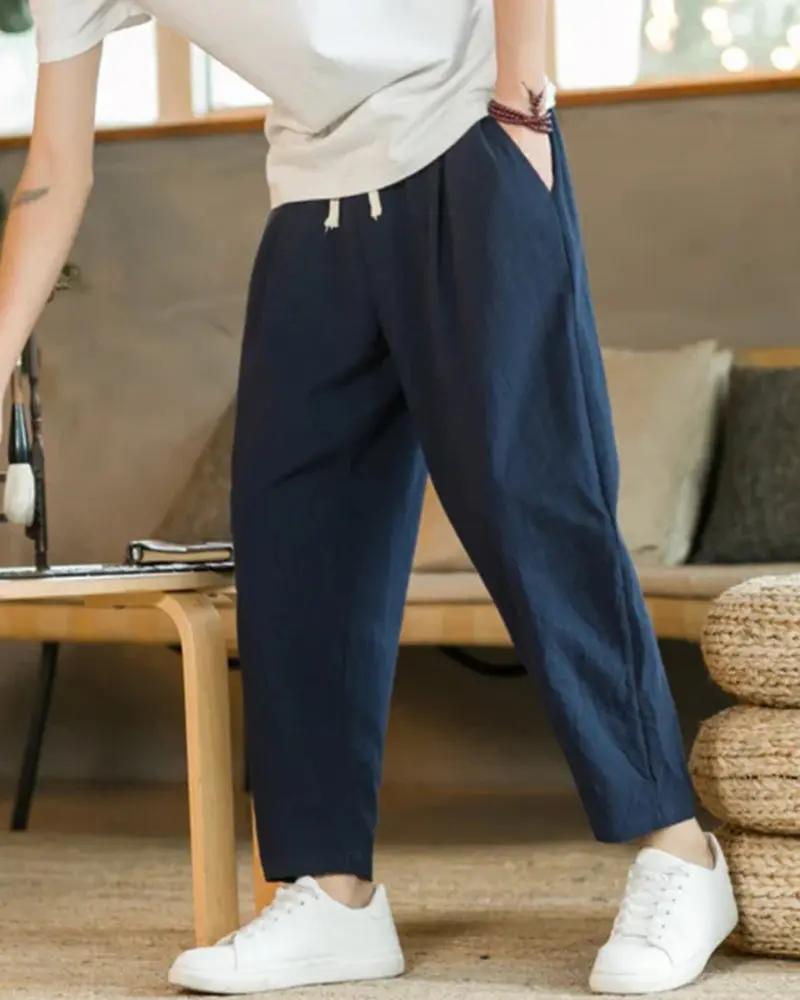 Pantalon beige en coton Old Money Cancun, coupe décontractée, tissu léger et confortable, vue de l’avant.