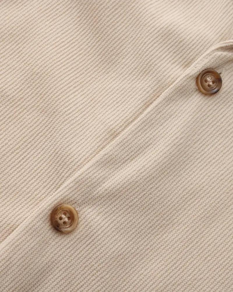 Ensemble de cordon en velours beige Riviera de la marque Old Money, avec veste et pantalon assortis.