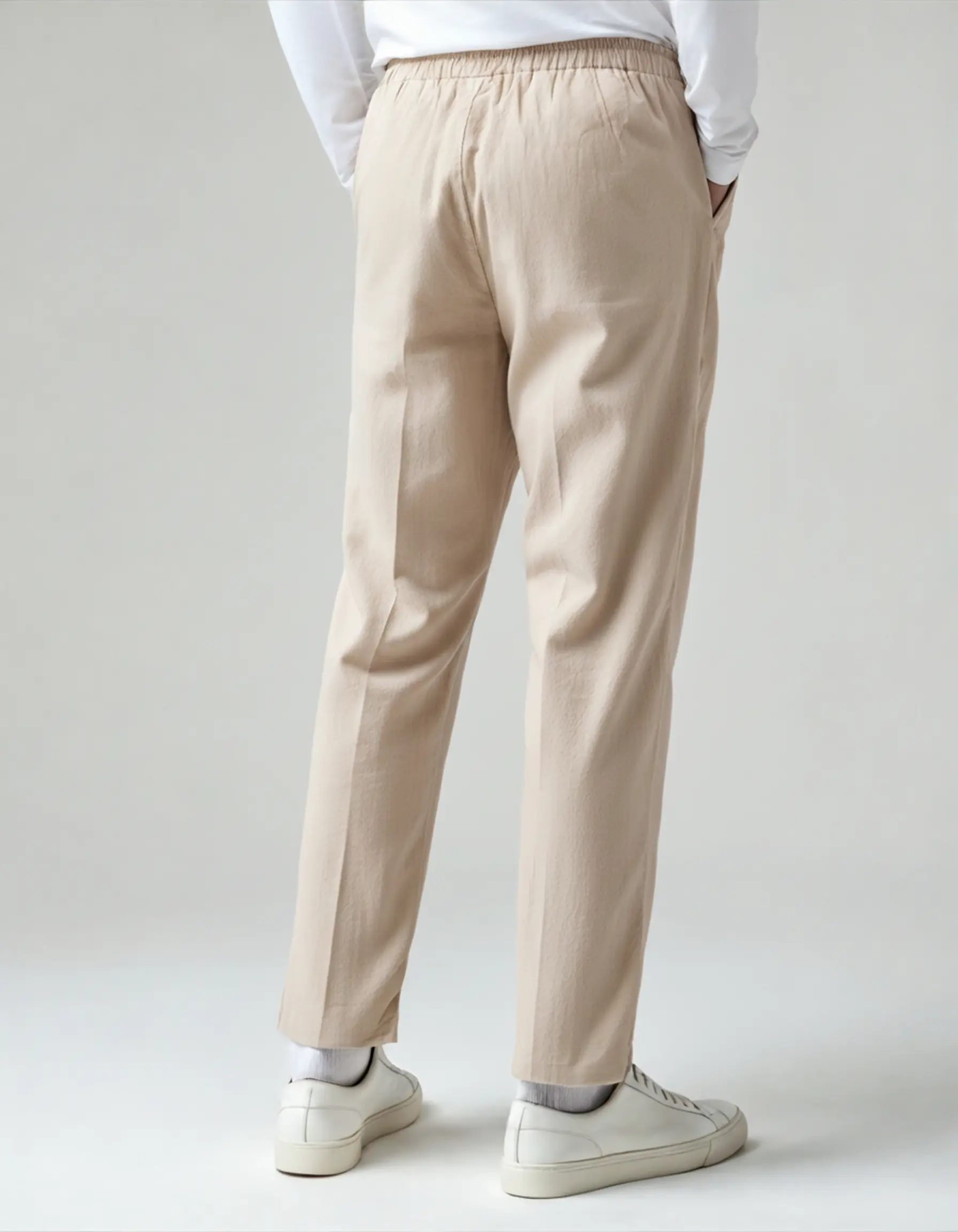 Pantalon en lin beige Zanzibar de la marque Old Money, coupe élégante et tissu léger pour un style décontracté.