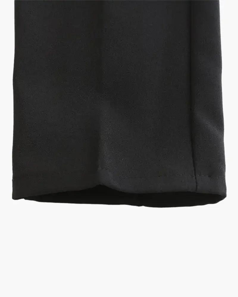 Pantalon stretch noir Augusto de la marque Old Money, coupe slim, tissu extensible, porté sur un mannequin.