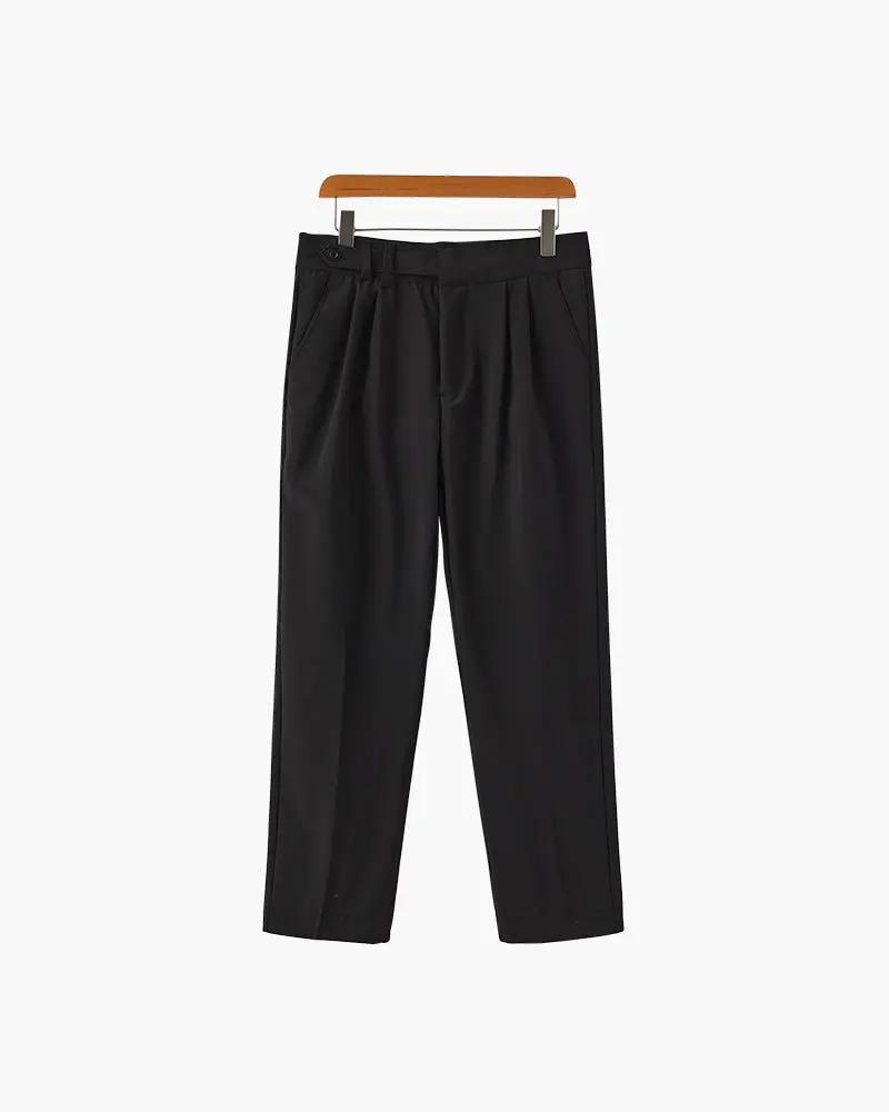 Pantalon taille haute Paris de Old Money en noir, coupe ajustée, tissu fluide, look élégant et moderne.