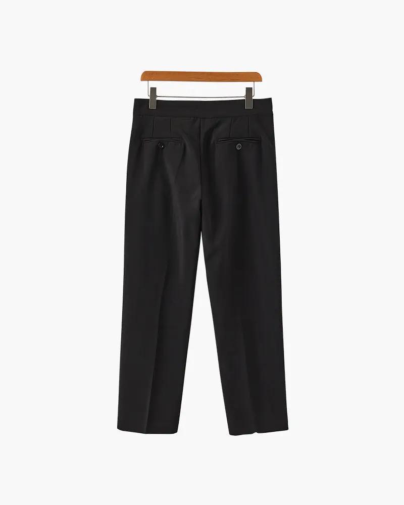 Pantalon taille haute Paris de la marque Old Money, coupe ajustée et élégante en tissu noir pour femmes.