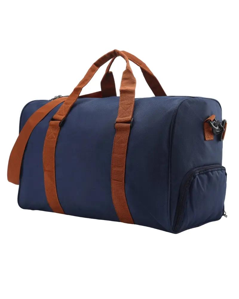 Sac de voyage Old Money Nova Duffle en bleu avec poignées en cuir et fermeture éclair robuste, idéal pour les escapades.