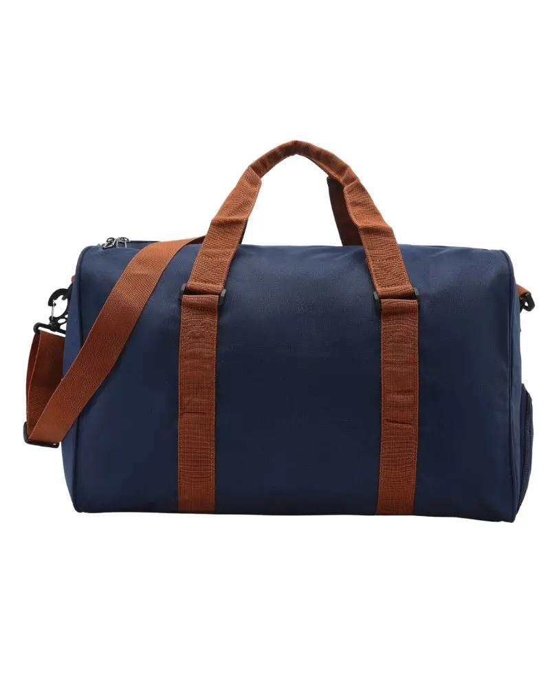 Sac de voyage Nova Duffle d'Old Money en bleu, avec poignées en cuir et grande capacité pour le sport ou les voyages.