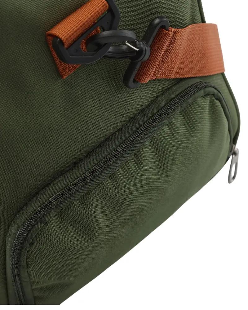Sac à bandoulière Old Money Nova Duffle bleu en toile solide, avec poignées en cuir et fermeture éclair robuste.