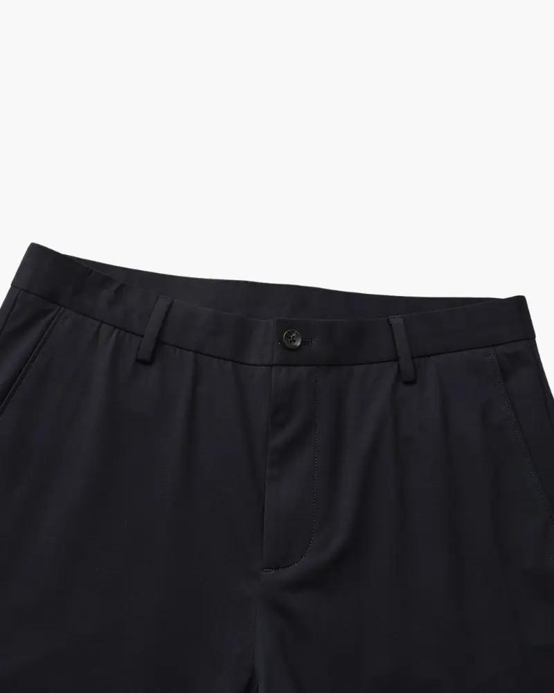 Pantalons en laine mélangée marron de la marque Old Money, coupe classique et détails élégants visibles sur l'image.