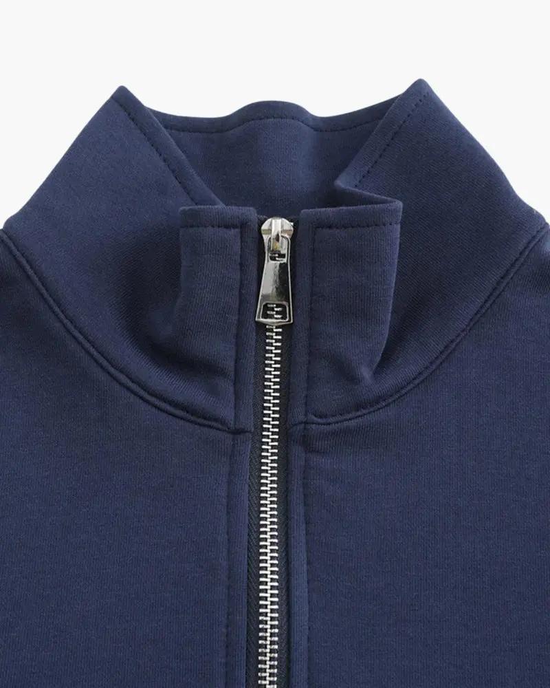 Veste en coton Miami de Old Money, zip-up bleu clair, vue de face avec col et fermeture éclair visible.