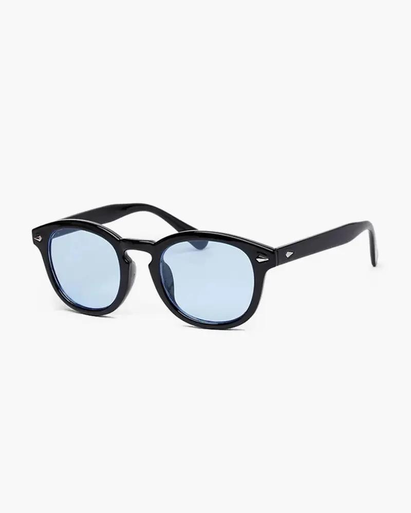 Lunettes teintées Old Money transparentes avec monture élégante, style vintage et look sophistiqué.