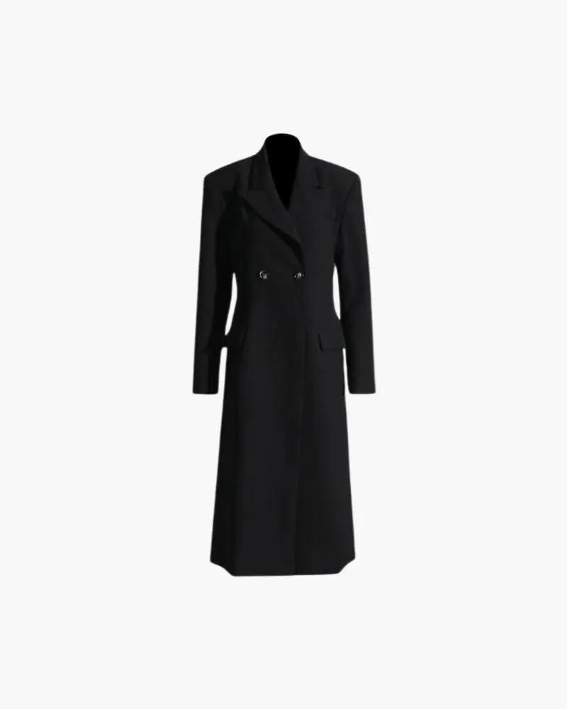 Manteau noir Old Money Women, élégant et classique, en tissu épais, porté par une femme dans une tenue sophistiquée.