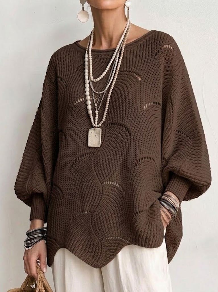 Haut en tricot Danoir Paris avec manches lanternes amples et motif en vagues creuses, vue de face.