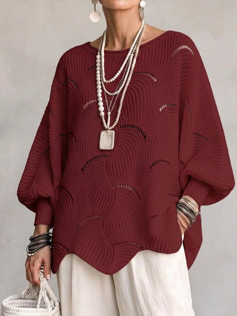 Haut en tricot Danoir Paris à manches lanternes amples avec motif en vagues creuses, vue de face.