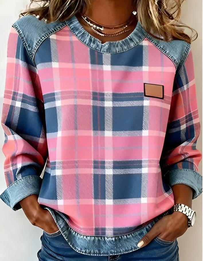 Sweatshirt en denim avec motifs ludiques, Danoir Paris, vue de face, détails colorés et design tendance sur tissu en denim.