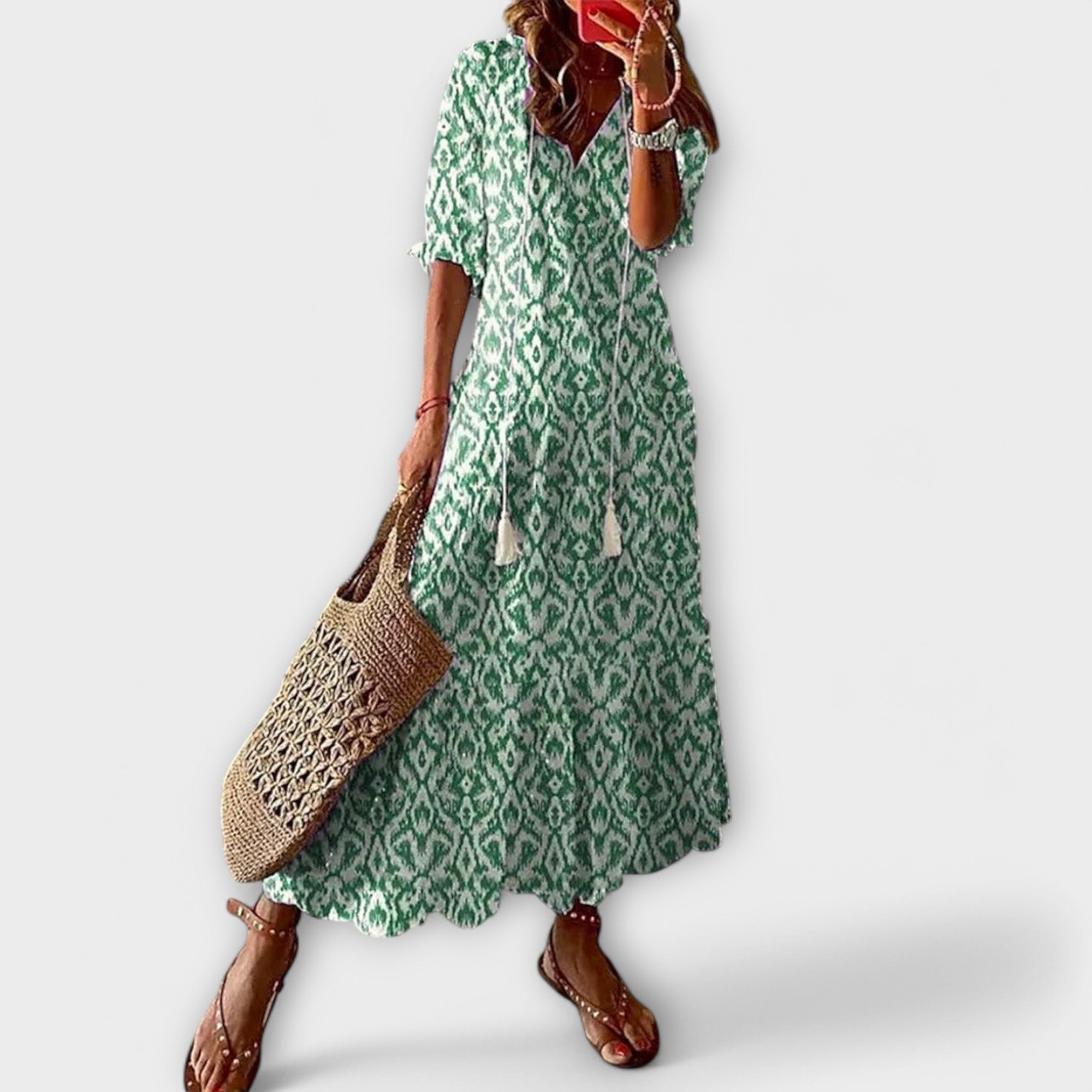 Robe longue verte Savannah de Danoir Paris, maxi dress élégante avec design fluide et détails sophistiqués.