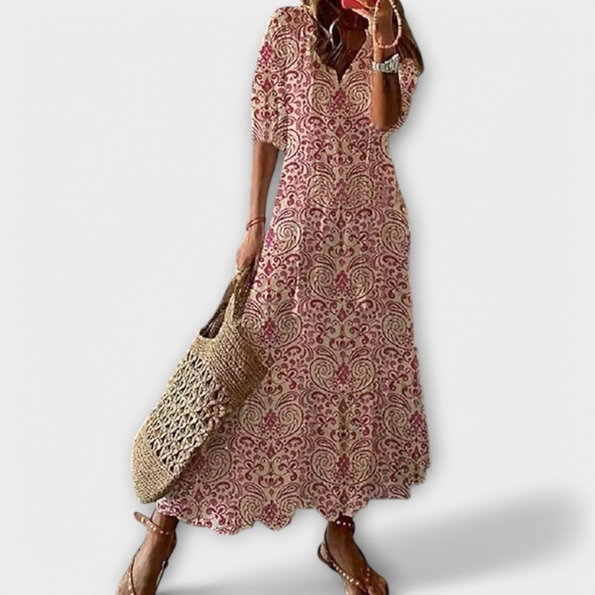 Robe longue maxi Savannah de Danoir Paris en tissu rose vif, avec style élégant et coupe fluide.
